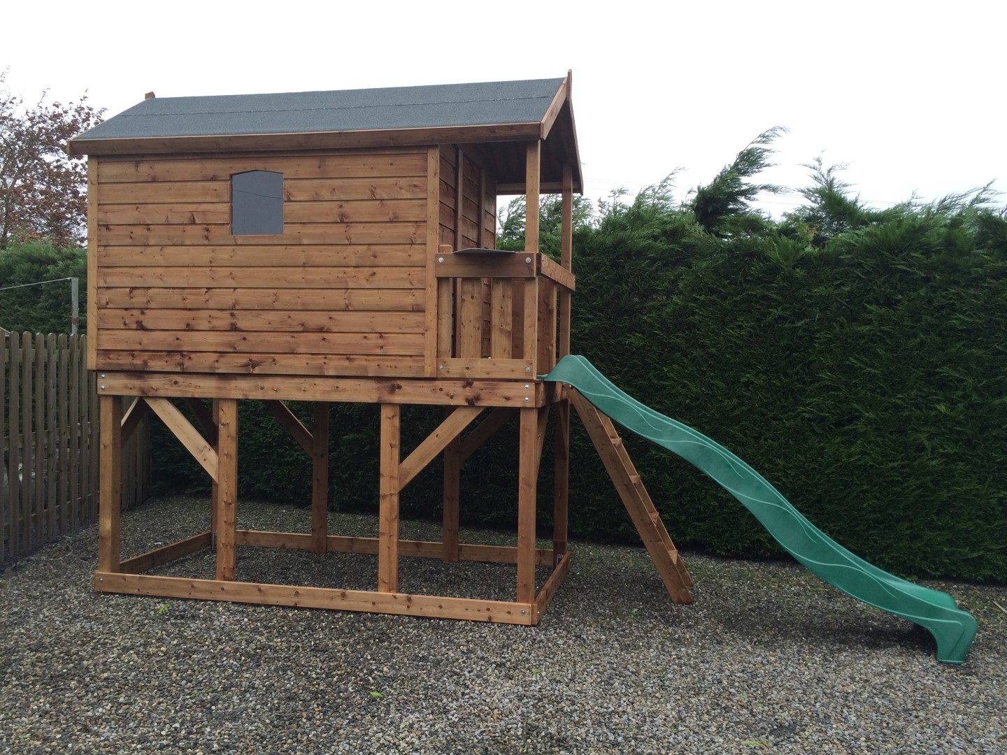 Deluxe tree house with rockwall ,slide and access ladder